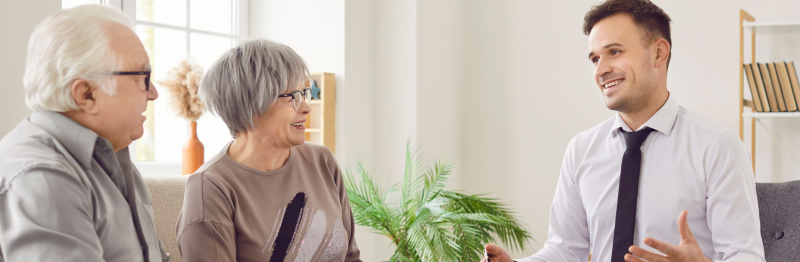 Older Couple Discussing If You Can Sell a Term Life Insurance Policy With Financial Advisor